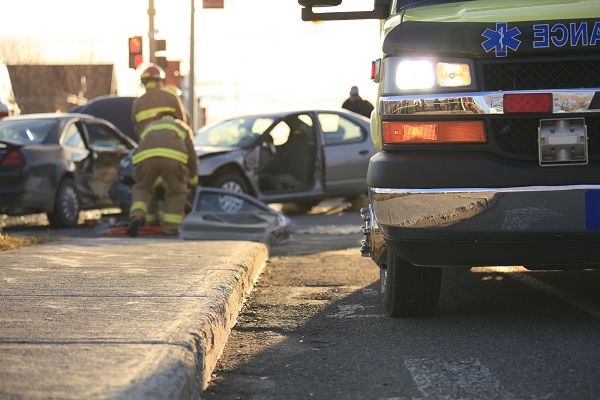 Car accident scene in Illinois with ambulance and first responders