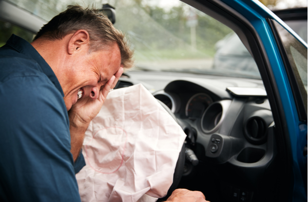 Male Motorist Injured In Car Crash With Airbag Deployed Male Motorist Injured In Car Crash With Airbag Deployed