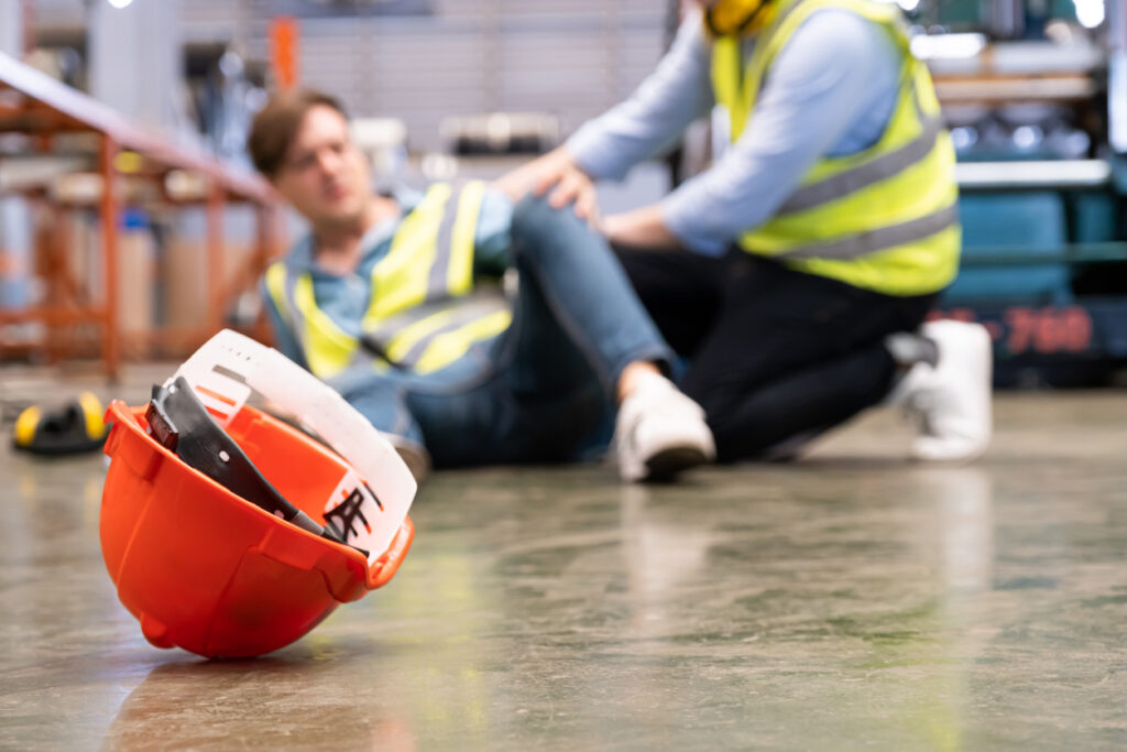 Man on the ground after a workplace injury in Chicago